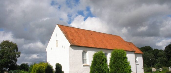 Foto: Tolne kirke Public Domain, https://commons.wikimedia.org/w/index.php?curid=593742