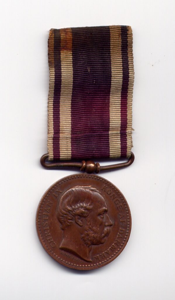 Erindringsmedalje for deltagelse i krigen i 1864 - forside